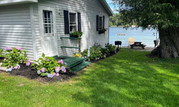 Traverse City Cottage | Traverse City's Silver Lake, DIRECT sandy beach waterfront on all sports lake.