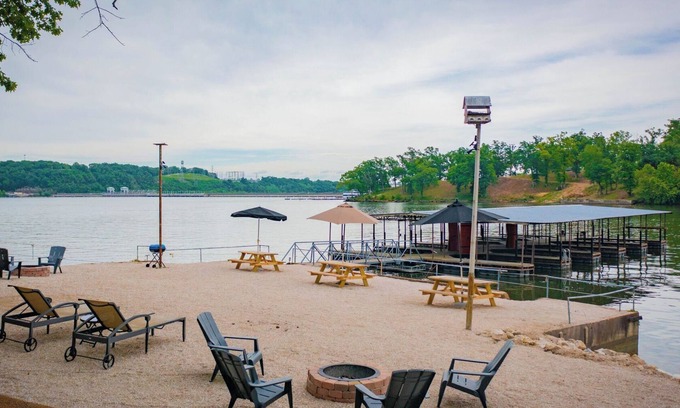 Lake Ozark Cabin | Tree house, fire pit, and walk to Bagnell Dam area.
