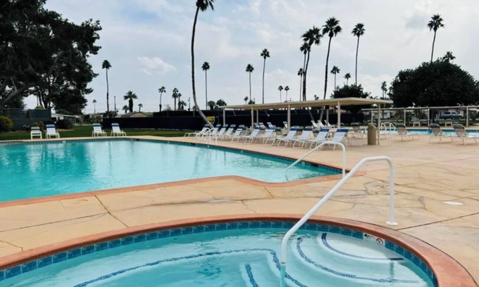 Thousand Palms House | TRI PALMS ESTATES Desert Retreat- on a golf course.