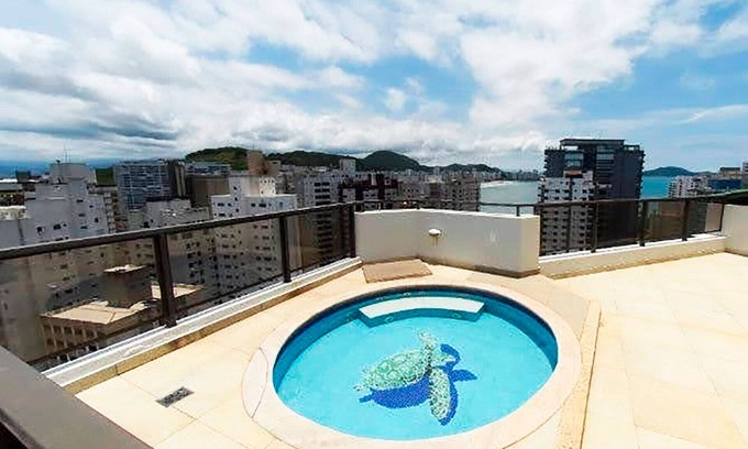 Tombo Apartment | Triplex a 260m da Praia das Astúrias - Guarujá/SP