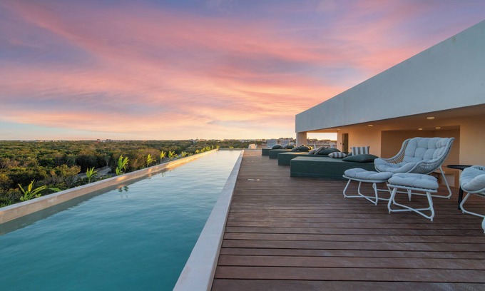 Playa Paraiso Apartment | Tropical 2 Bedroom | Private Balcony & Rooftop | Casago