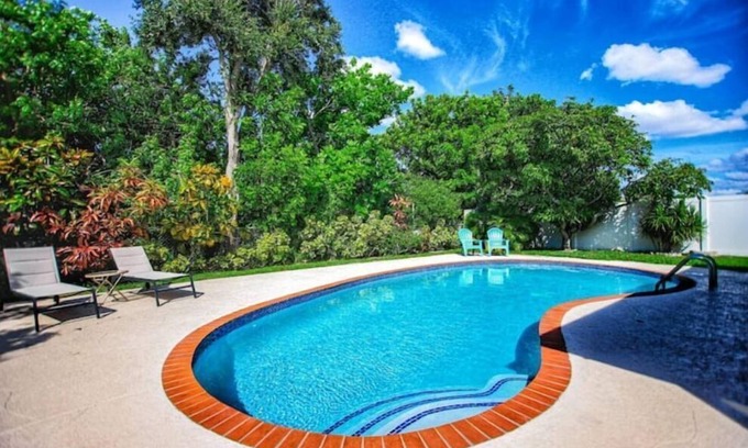 Villages of Palm Beach Lakes House | Tropical 3 Bedroom Oasis with Private Pool.