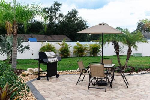 Crystal Lake House | Tropical Backyard Paradise, Hot Tub, Fenced yard