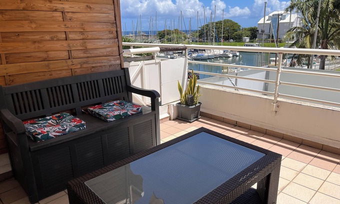 Riviere-Sens Apartment | Tropical Golden apartment, sea view and beach 5min walk away