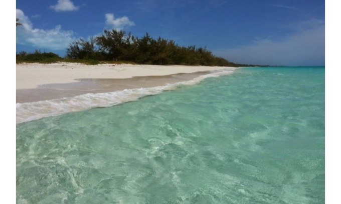 Nassau Cottage | Tropical Leisure 2BR cottage with beach nearby