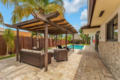 Tamiami House | Tropical Oasis with Heated Pool and BBQ