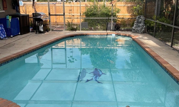 Venice Gardens House | Tropical vacation house with large, heated pool and spacious, open floor plan