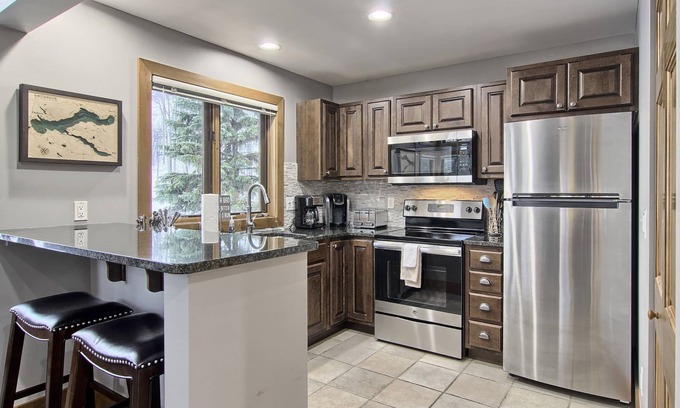 Boyne Falls Condo | Truly Slopeside on Boyneland - 5BR | Ski Locker with Boot Heater | Fireplace