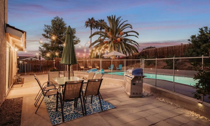 Rowland Heights House | Twilight Paradise: 4 Bedrooms, 2 Bathrooms, Private Pool, Patio Dining for 8, BBQ, and a One-of-a-Kind Indoor Fireplace.