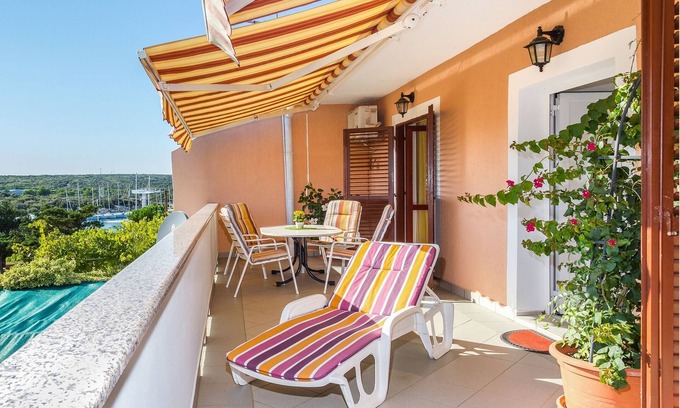 Simuni Apartment | Two bedroom apartment with terrace and sea view Šimuni, Pag (A-4083-a)