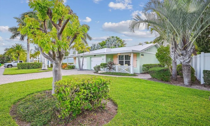 Holmes Beach Cottage | Two Bedroom Cottage with Tropical Landscaping Surrounding Private Heated Pool!