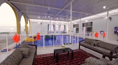 Khor Fakkan House | Two bedrooms - Waeb Holiday Home