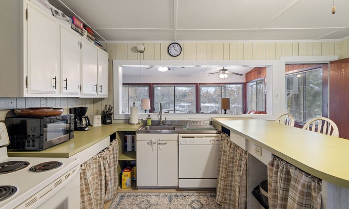 Acme House | TWO homes on Black River Lake with TWO boat slips!