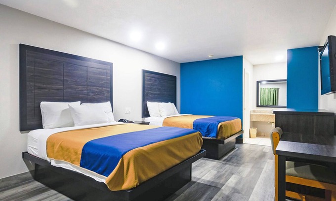 Wharton Hotel | Two Queen Beds Non Smoking Room at Scottish Inns and Suites!