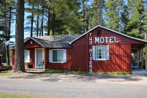 Trout Creek Hotel | Two Rivers Motel and Cabins of Kenton, MI