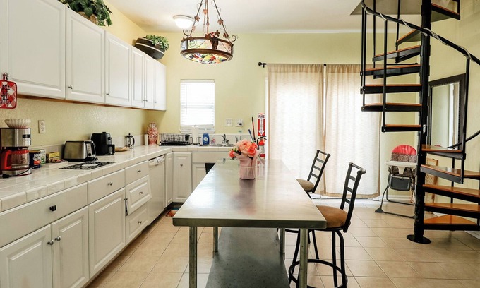 San Jacinto House | Two Story Yellow home