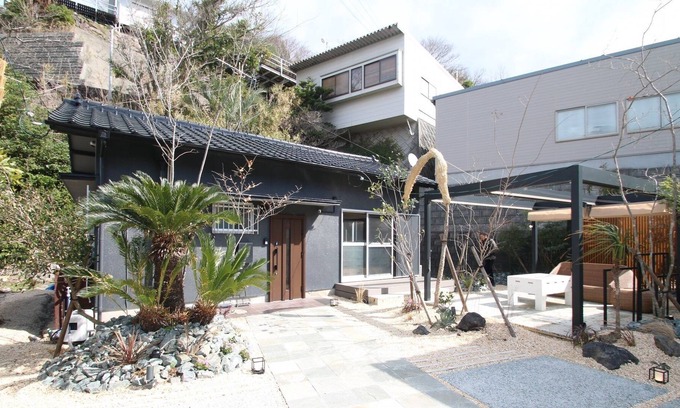 Kamiamakusa House | UmiSoraIe Beach house with garden living room / Kami Amakusa Kumamoto