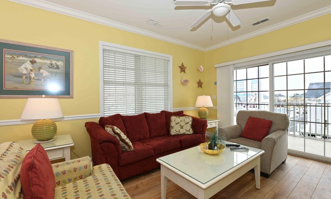 Ocean City Condo | Unique, festive 3-bedroom luxury condo with adorable coastal decor and free WiFi located downtown on the bayside and just two blocks to the beach and Boardwalk!