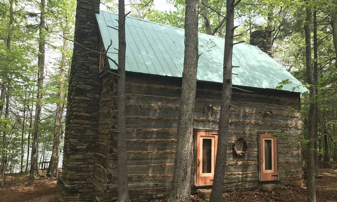 Huddleston Cabin | Unique Historical log cabin with private beach and 300 ft. of waterfrontage.