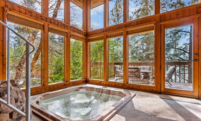 Liberty Lake House | Unique lakefront hideaway with four decks, dock, private hot tub & wood stove