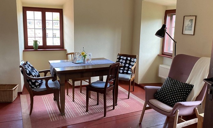 Bastheim Apartment | Unique vacation apartment with a view over the monastery grounds and the romantic garden (60sqm)