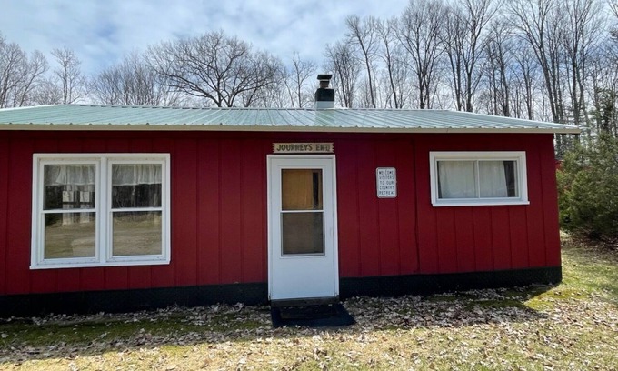 Gleason Cabin | Unplug from it all at a lovely 2-bedroom cabin nestled in the woods!