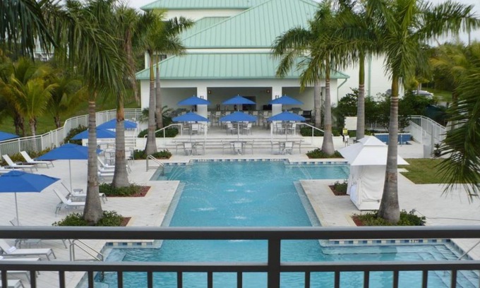 Ludlam House | Unwind and Relax in this Stunning Accommodation! Balcony | Outdoor Pool + Spa