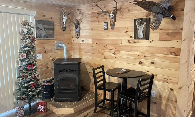 Rapid River House | UP Riverfront Cabin with rustic charm & modern amenities. Great for families!