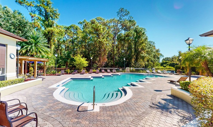 Orlando Apartment | Updated apartment with community pool & gym - balcony, W/D, and great location