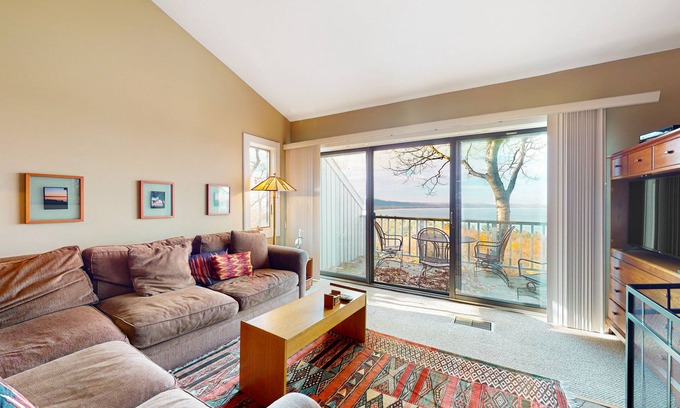 Maple City Condo | Updated condo in Glen Arbor with Lake Michigan views, fireplace, deck, W/D