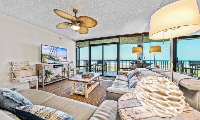 New Smyrna Beach Condo | Updated direct oceanfront condo with large private balcony and a beachfront pool