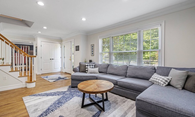 Oakdale House | Updated home with canal & hot tub in backyard. Close to everything!
