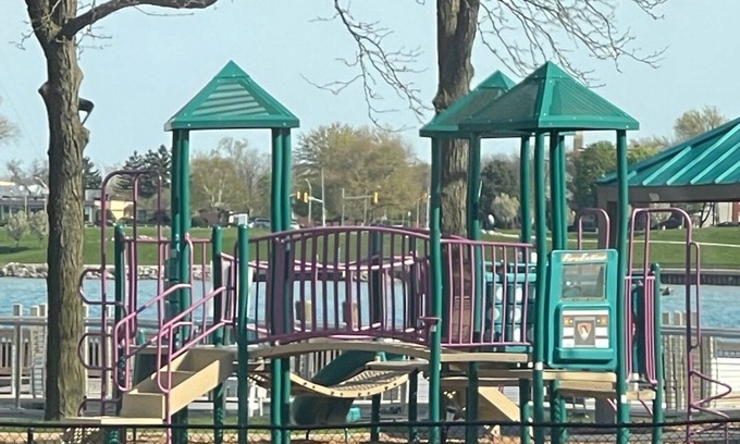 Detroit Apartment | Updated riverfront apartment with balcony and wonderful view of the river.