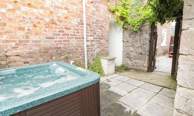 Hendrerwydd Cottage | UPPER GARDENER'S COTTAGE, pet friendly, with hot tub in Denbigh
