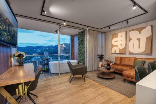 El Tesoro Apartment | Urban 2505 - Oasis con piscina, sauna y gimnasio