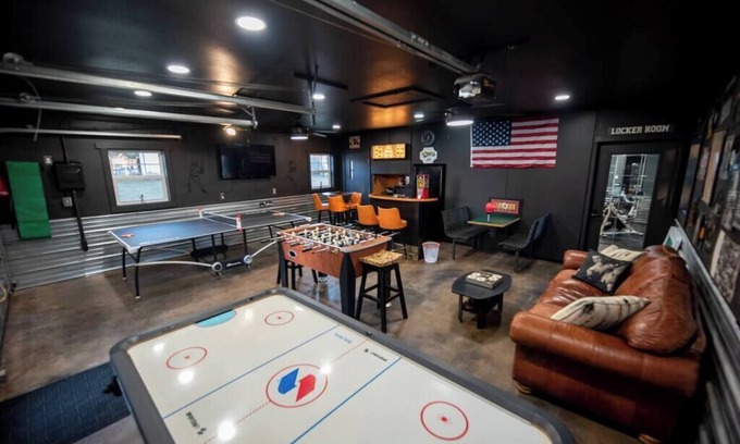 Decorah House | Urban Edge | Comfort & Fun: Large Game Room & Fitness Room