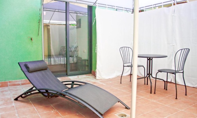 Vic - Remei Apartment | Urban Manesa city center apartment with private patio