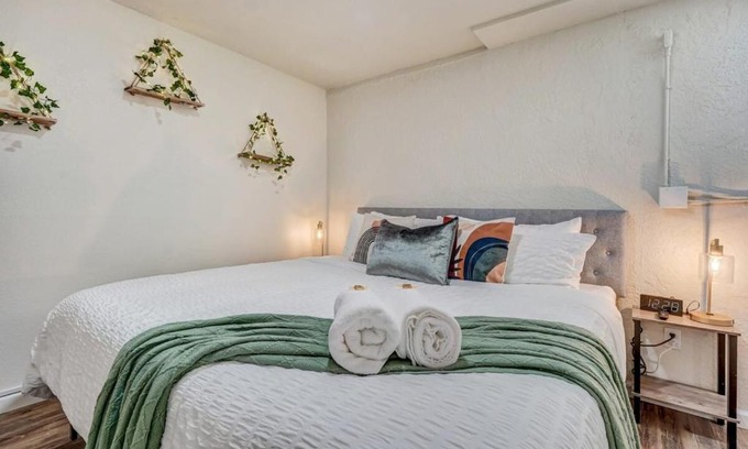 East Colorado Springs Apartment | Urban Reprieve King Bed BBQ Fire Pit & Views