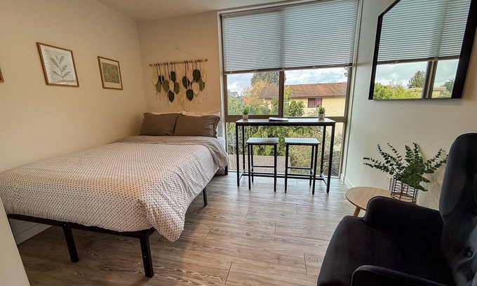 Old Ballard Apartment | Urban studio unit with patio views, shared lounge space and dedicated workspace