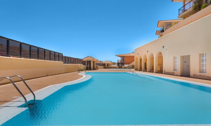 Caleta de Fuste House | Vacation Home 'Casa Miramar' with Sea View, Shared Pool and Private Terrace