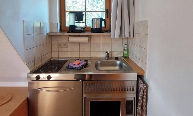 Augustusburg Apartment | Vacation apartment garden house 1st floor in listed Lotterhof