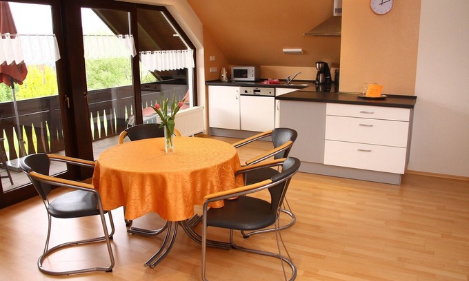 Grossheubach Apartment | Vacation apartment "Engelbergblick" with large panoramic window and balcony| 4 stars