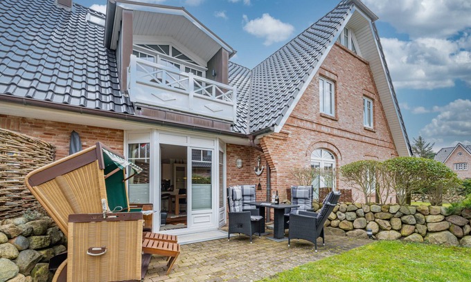Westerland Apartment | Vacation apartment for up to 4 people with terrace and sauna.