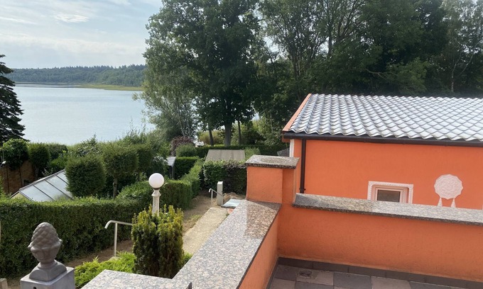 Murchin House | Vacation apartment/vacation bungalow/vacation home with lake view off Usedom