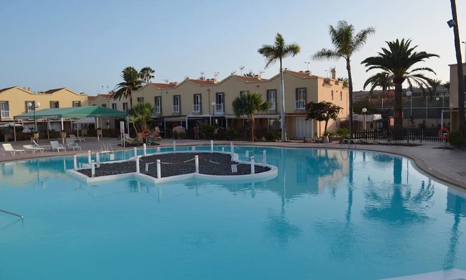 Sonnenland Apartment | Vacation 'Green Oasis Club' with Shared Pool, Wi-Fi and Air Conditioning