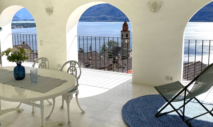 Porto Ronco House | Vacation home in the heart of the village with roof terrace and spectacular views