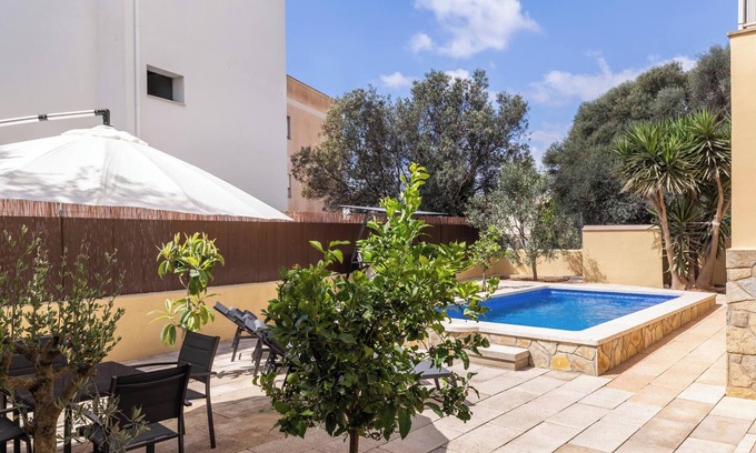Portocolom House | Vacation Home “Calamar 7” with Sea and Mountain View, Rooftop Terrace, Garden & WiFi