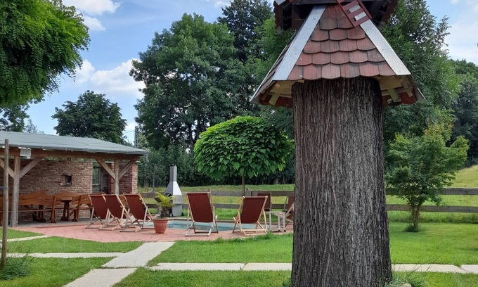 Heinsdorfergrund House | Vacation home with pool, garden, covered barbecue area and large dining table