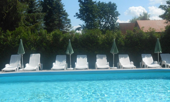 Balatonmariafurdo House | Vacation home with pool, WLAN, playground, direct lake access
