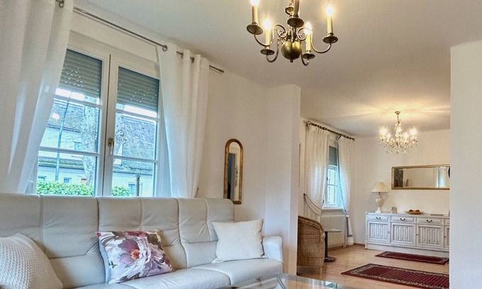 Reutin House | Vacation home Köchlin - charming semi-detached house with garden and parking space